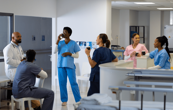 Doctors and nurses in a break room discussing diagnostic errors