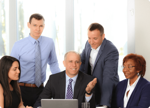 The medical malpractice attorneys of FHVG sitting at a table together